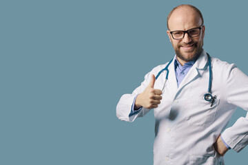 Confident doctor giving a thumbs up