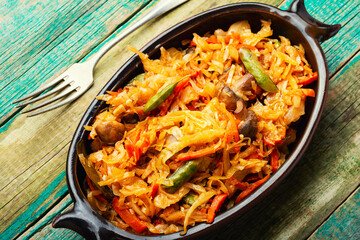 Cabbage stewed with mushrooms.