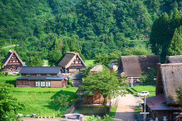 Fototapeta na wymiar Nanto, Japan - Jul 31 2017- Gassho-zukuri houses at Suganuma village, Gokayama area, Nanto City, Toyama Prefecture, Japan. UNESCO World Heritage Site - Historic Villages of Shirakawa-go and Gokayama.