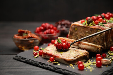 Traditional French terrine covered with bacon on dark wooden background with Christmas decorations - obrazy, fototapety, plakaty