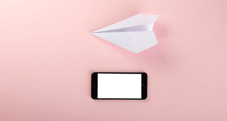 Paper plane letter document message. Top view mock up design of airplane travel and mobile phone,...