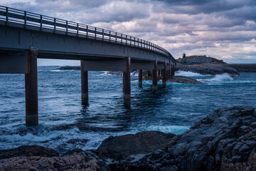 Obraz premium Atlantic Ocean Road in Norway is one of the most beautiful and dangerous roads in the world. The most famous part is the Storseidundet Bridge, also called the 