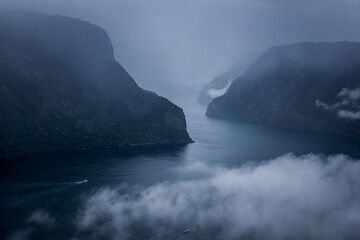 Fototapeta na wymiar Fjærland (Mundal) in the valley of the longest fjord in Norway. During the rain.