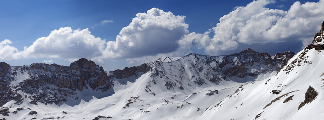 Fototapeta na wymiar Panorama of snow mountains in spring