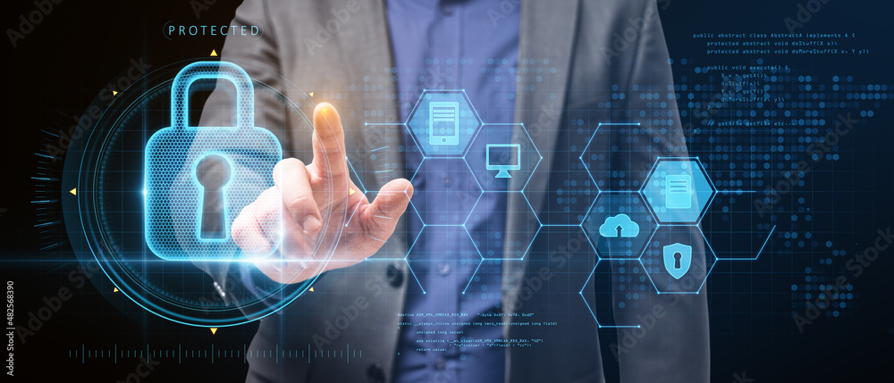 Poster close up of business man hand pointing at abstract glowing keyhole padlock interface on blurry backg
