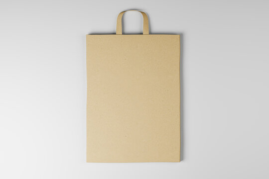 Close up of blank paper bag on white background. Mock up place for your advertisement or logo. 3D Rendering.