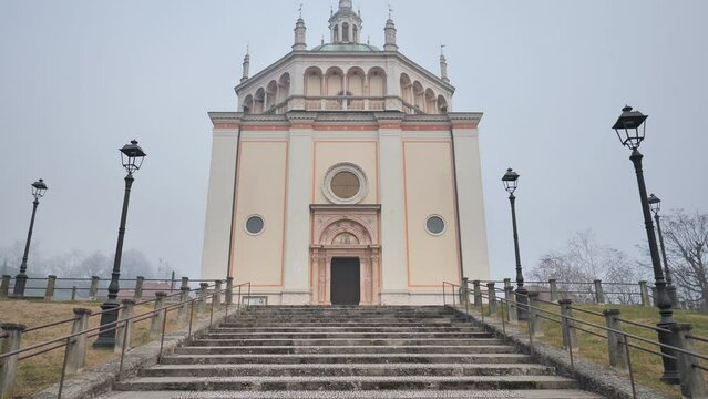 Crespi d'Adda church facade and stairs in historic worker village Unesco Herritage. Lombardy, Italy