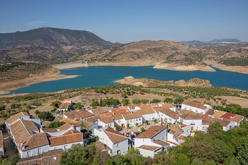 Naklejka na ściany i meble The white houses of Zahara de la Sierra with the reservoir in the background