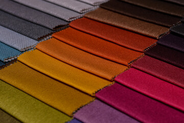 Samples of furniture fabrics.Multicolor fabric texture background.