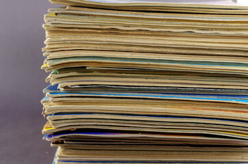 Collection of old comics and magazines against a gray background