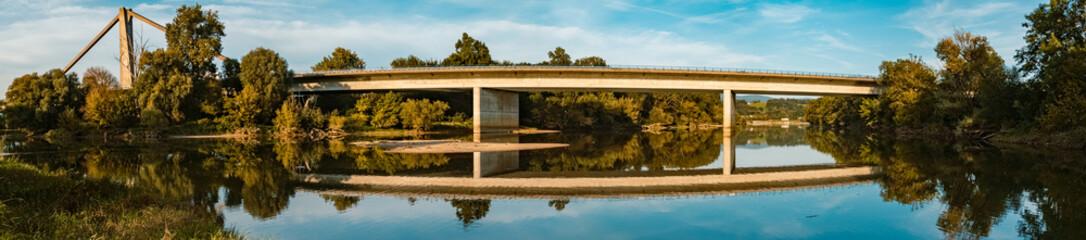 Fototapeta premium Beautiful summer view with reflections at Mettenufer, Danube, Bavaria, Germany