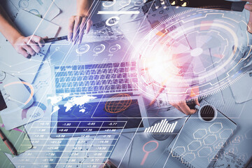 Double exposure of man and woman working together and technology theme drawing hologram. Big data concept. Computer background.