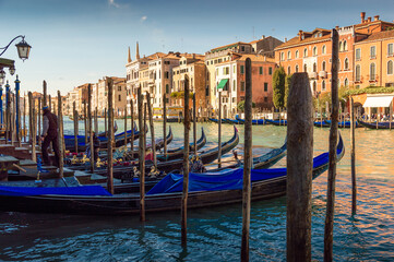 Fototapeta na wymiar Gondole and typical buildings at Venice, Italy