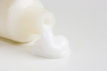 Close up image of ointment tube with squezzed product