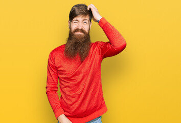 Redhead man with long beard wearing casual clothes confuse and wonder about question. uncertain...