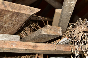 Old boards and bars on a dark background.