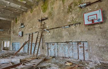 Abandoned school in Pripyat, Chernobyl zone. Abandoned gym.