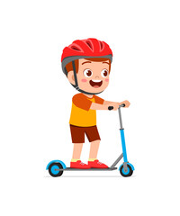 cute little boy riding scooter and wear helmet