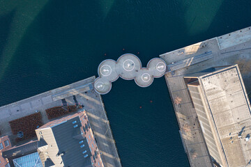 Copenhagen, Denmark - January 14, 2022: Aerial drone view of the modern Circle Bridge, a pedestrian...