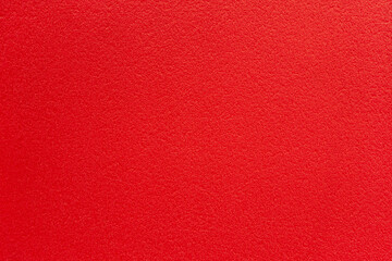 abstract background of red soft plush furniture upholstery close up