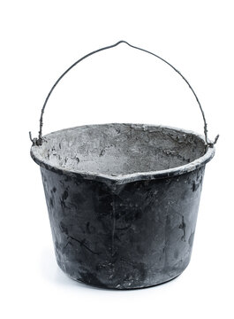 5 Gallon Black Plastic Bucket Used For Mixing Concrete Isolated On White