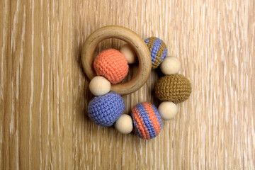 Fototapeta na wymiar knitted rattle