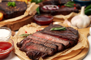 Concept of tasty food with beef steaks, close up