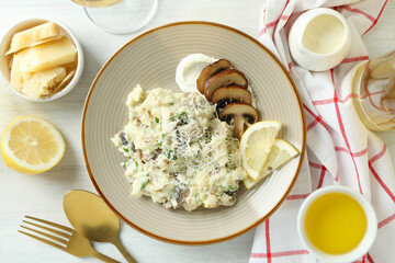 Concept of tasty food with risotto with mushrooms, top view