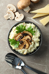 Concept of tasty food with risotto with mushrooms, top view