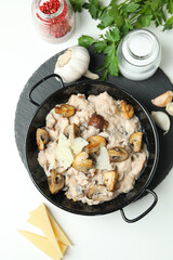 Concept of tasty food with risotto with mushrooms, top view