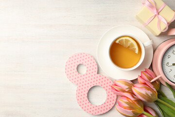 Woman day concept on white wooden background