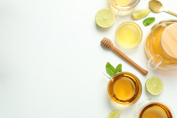 Concept of hot drink with buckwheat tea on white background