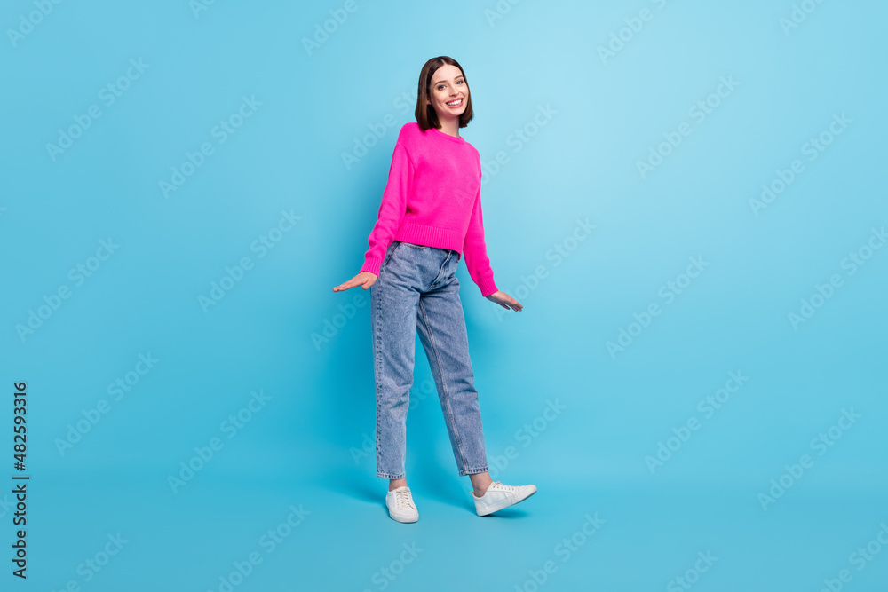 Wall mural Full length body size photo smiling girl wearing casual clothes isolated pastel pink color background - Wall murals