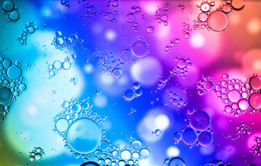 Abstract colorful background. Blurred colored drawing. Bubbles on a cheerful background.