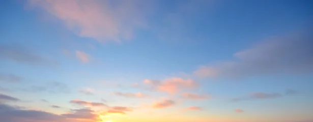 Clear blue sky with glowing pink and golden clouds after the storm. Dramatic sunset cloudscape. Concept art, meteorology, heaven, hope, peace. Graphic resources, picturesque panoramic scenery © Alex Stemmer