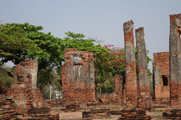 Fototapeta premium Adventure of exploring the ruins of red brick Wat Phra Si Sanphet temple (horizontal image), Ayutthaya, Thailand