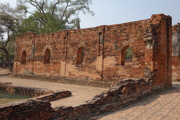 Adventure of exploring the ruins of red brick Wat Phra Si Sanphet temple (horizontal image), Ayutthaya, Thailand