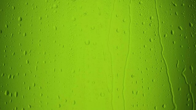 Kiwi falls into the juice. Slow motion 240 frames. Green juice. Fresh fruit