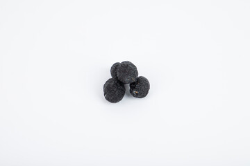 Black olives on white background.
