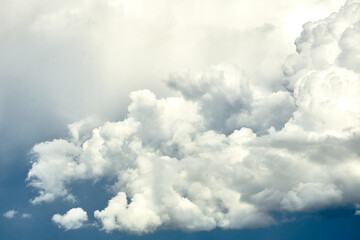 White porous clouds on the blue sky, cloudy landscape.