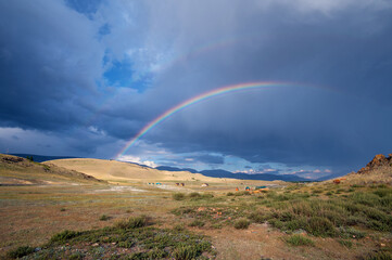 Rainbow in the Kurai steppe. Mountain Altai