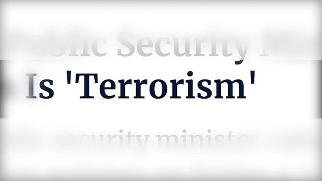 MACRO SHOT: Word terrorism alternating with different fonts on the pages of the media. Concept of urgent hot news about an attack and a crime against humanity. Selected text.
