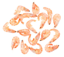 Unpeeled frozen shrimp on a white background