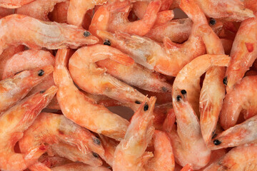 Unpeeled  frozen shrimp background texture