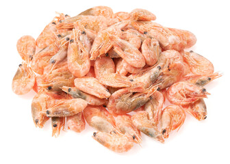 Unpeeled frozen shrimp on a white background
