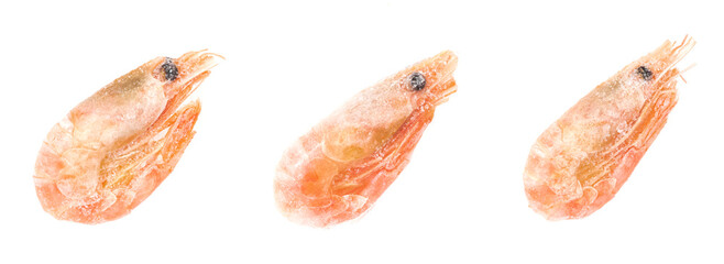 Unpeeled frozen shrimp on a white background. close-up