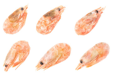 Unpeeled frozen shrimp on a white background. close-up
