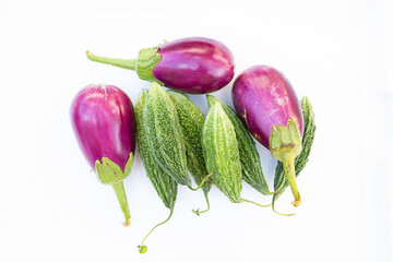 eggplant and bitter gourd isolated on white.