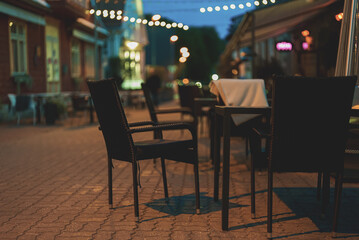 Night street with restaurants in Pärnu city in summer.