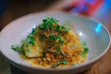 Cabbage with crispy topping in a restaurant.